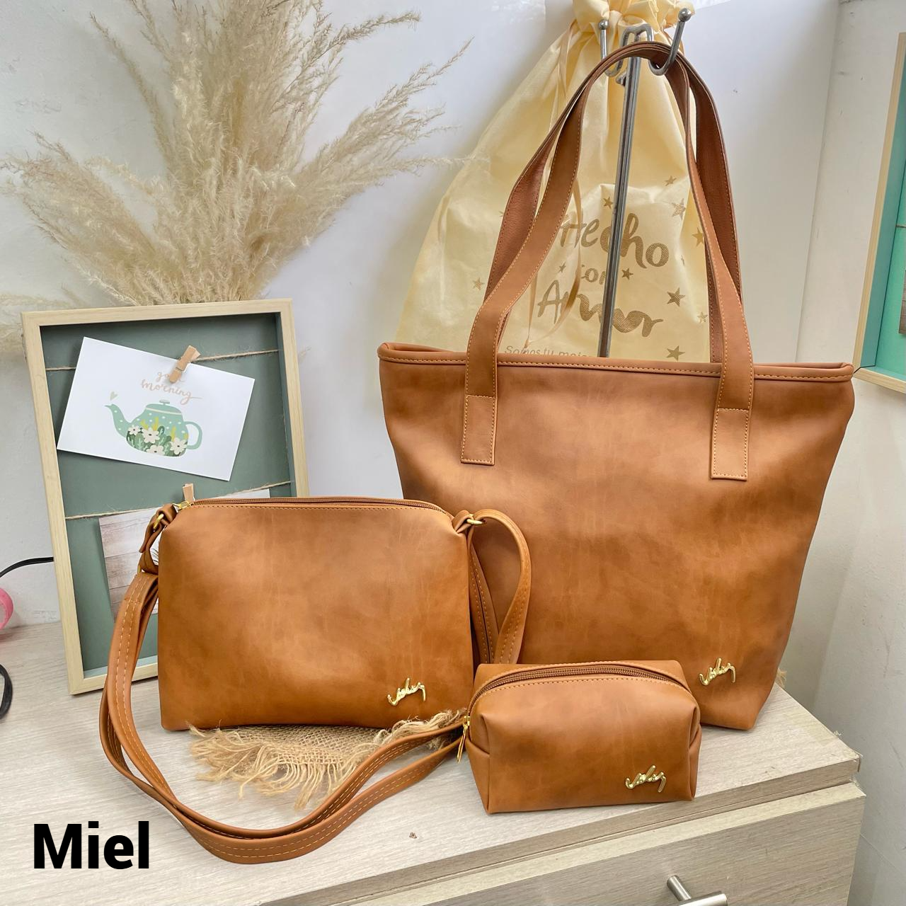 TRIO EN CUERO DACOTA DAMA REF SAFARI VLZ envio gratis